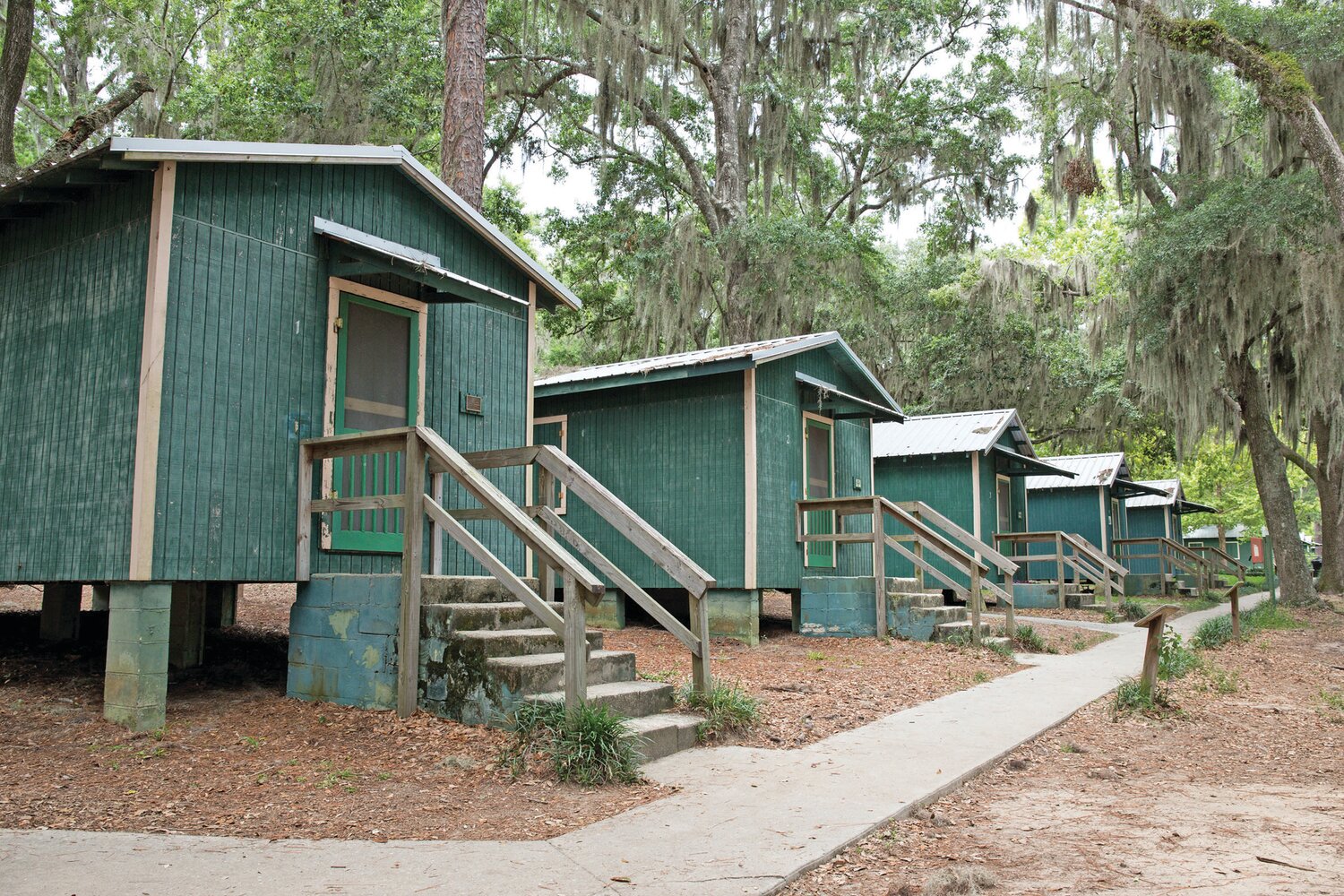 Historic cabins at Florida 4-H Camp Cherry Lake in 2019 before they were removed.